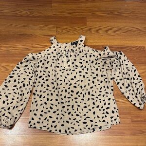 Women's Cream and Black Cold Shoulder Top with gold embellishments